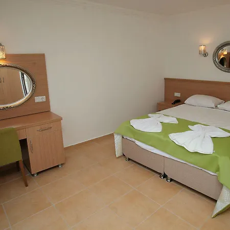 Taner Ολουντενίζ