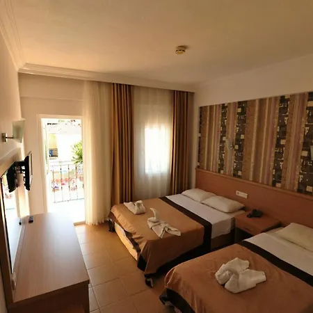 Taner Ολουντενίζ