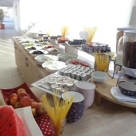 Taner Ολουντενίζ